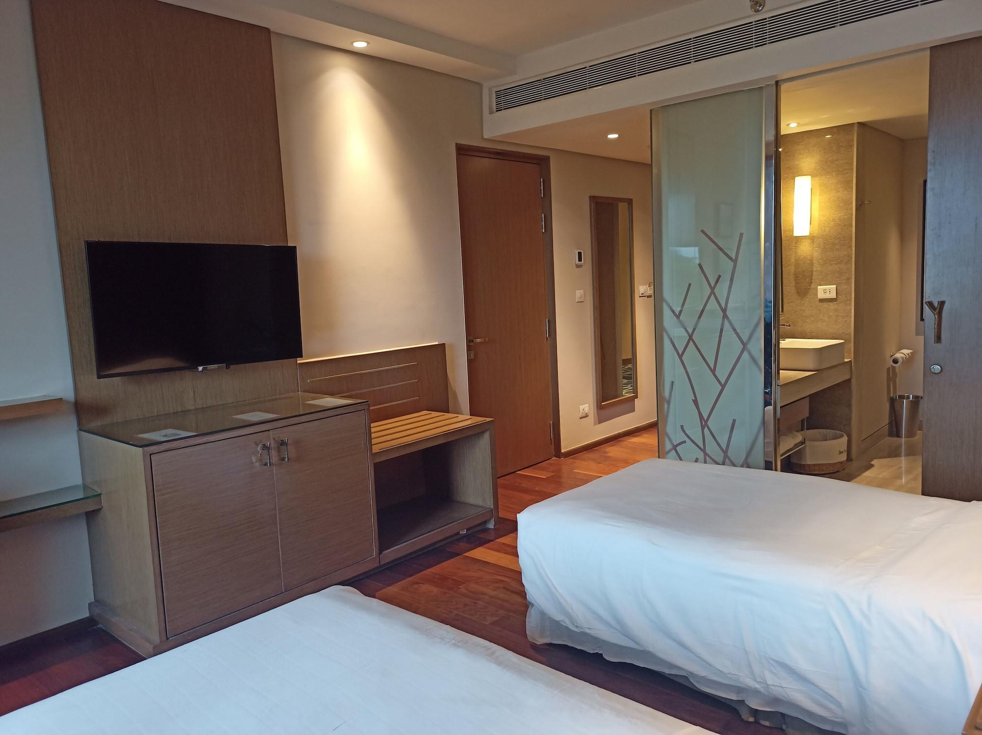 فندق ويلكوم هوتل بنجالور بنغالور المظهر الخارجي الصورة A room at the hotel