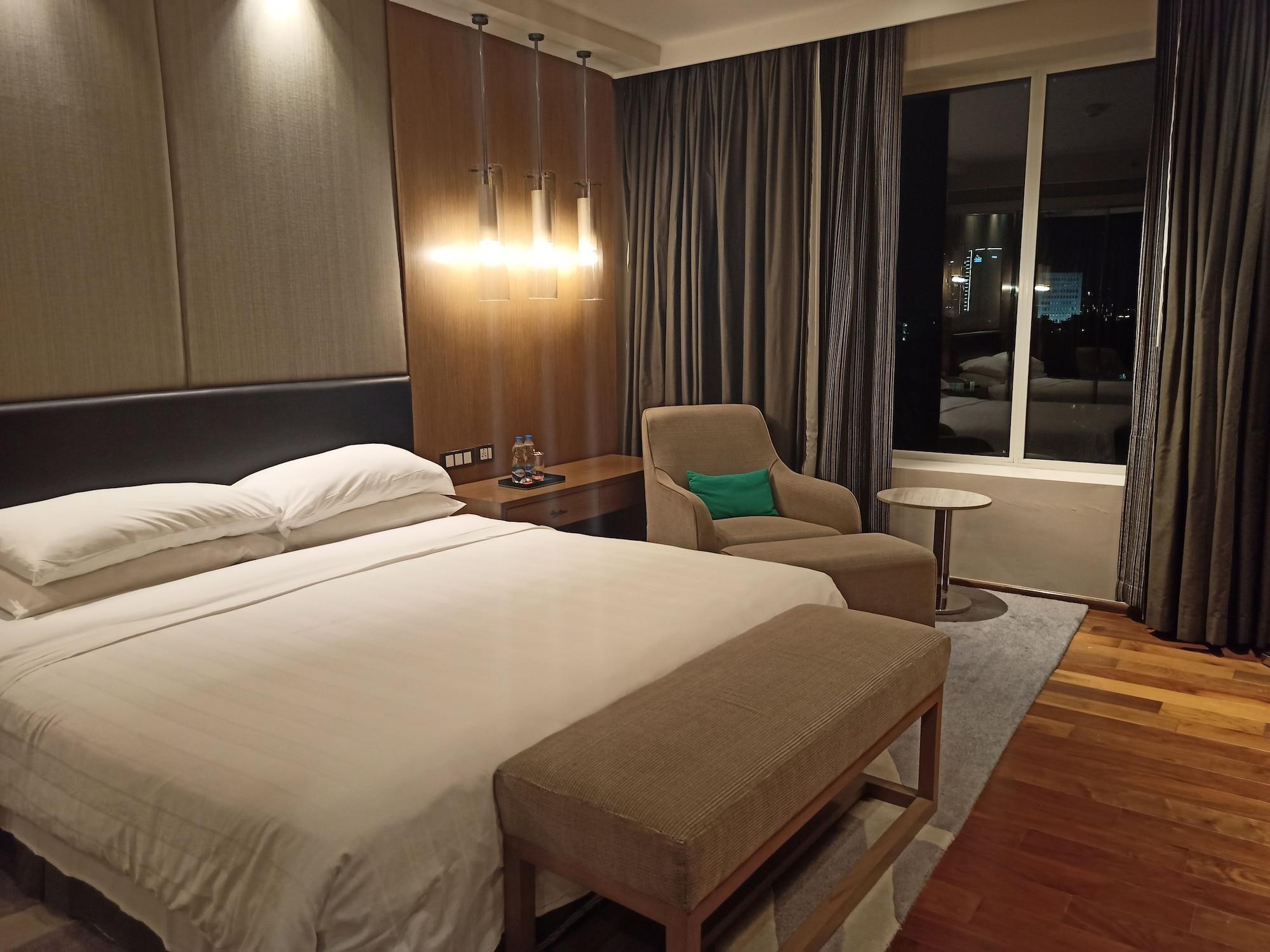 فندق ويلكوم هوتل بنجالور بنغالور المظهر الخارجي الصورة A room at the hotel