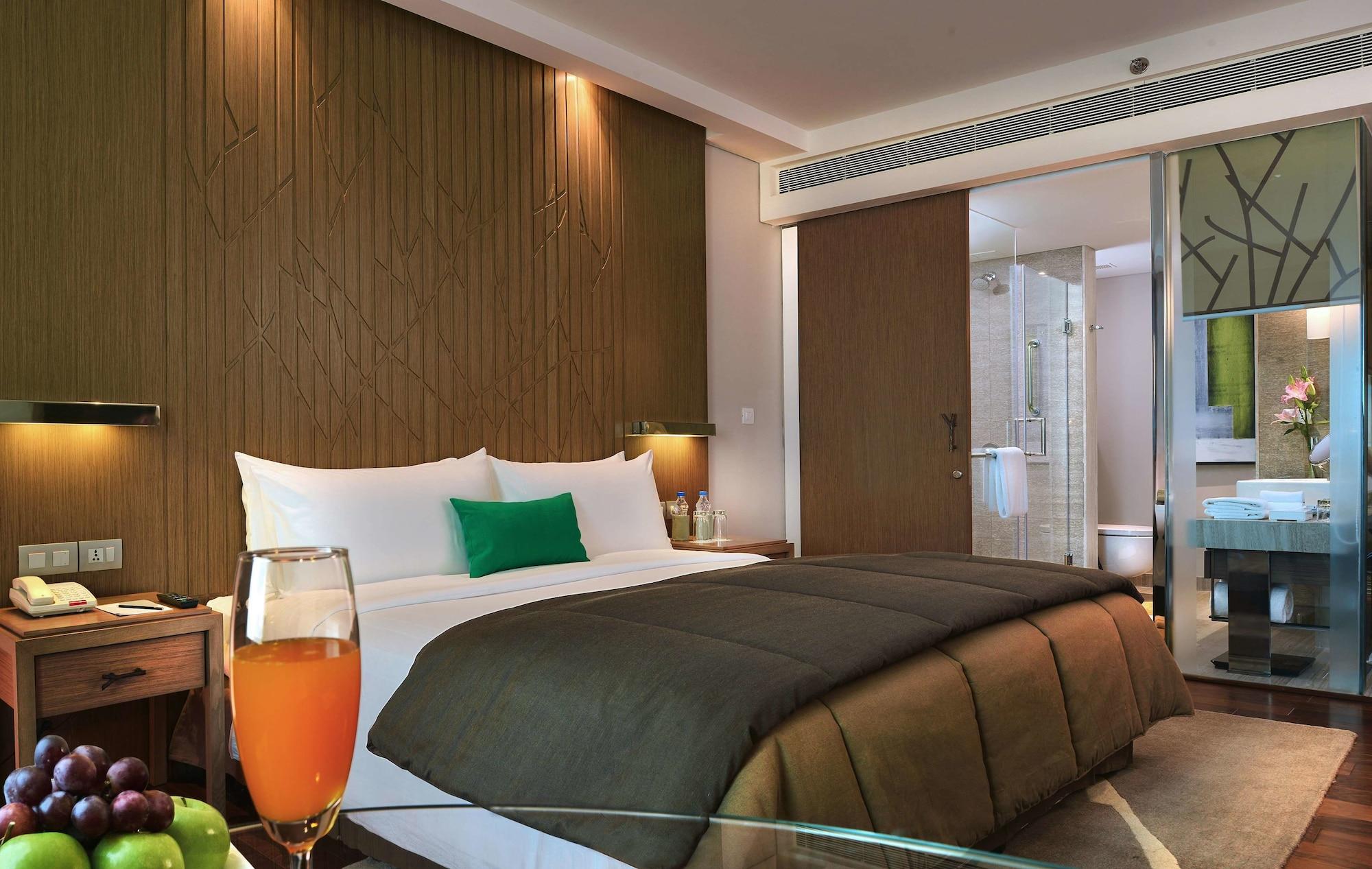 فندق ويلكوم هوتل بنجالور بنغالور المظهر الخارجي الصورة A room at the hotel